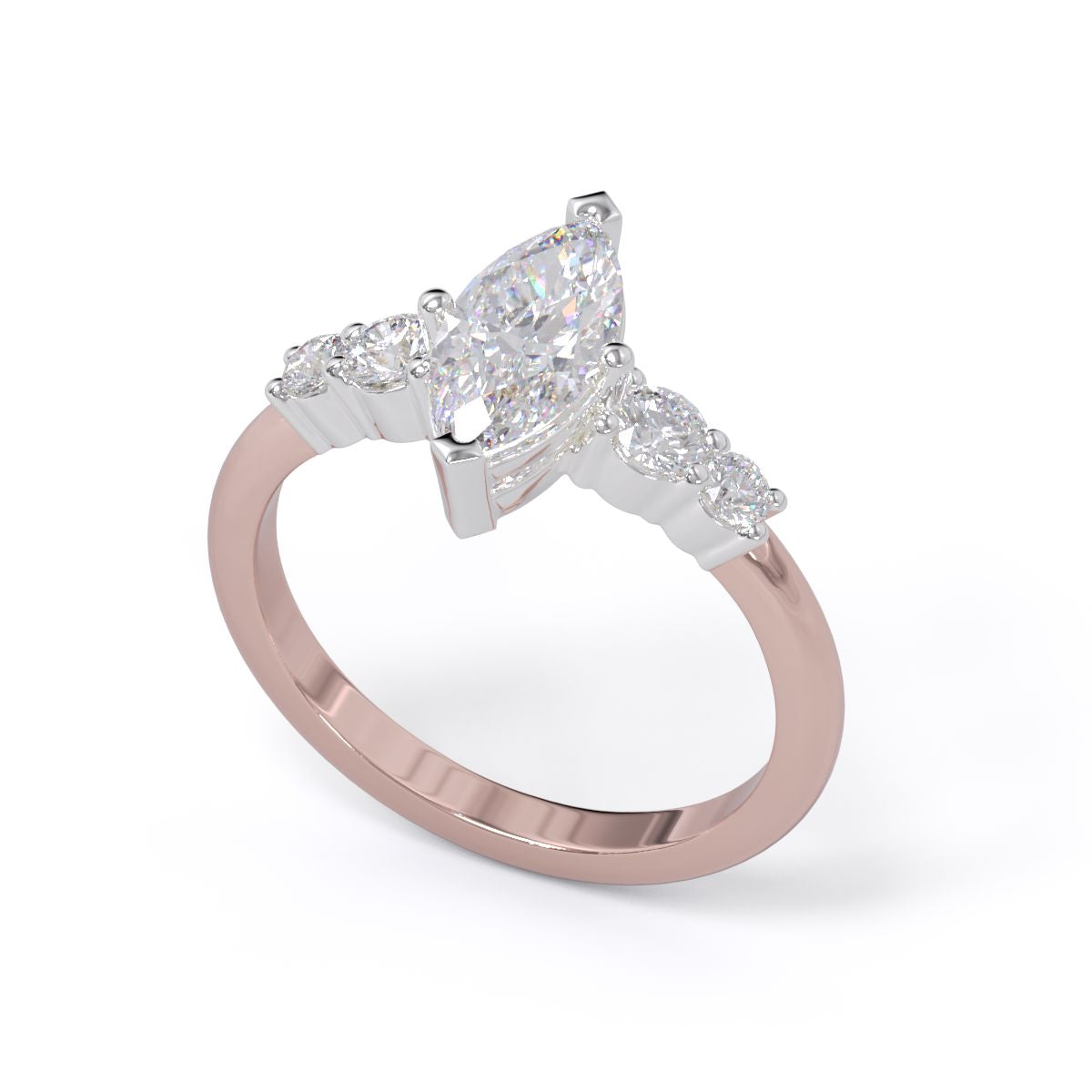 A marquise-cut diamond engagement ring with two round brilliant-cut diamonds on either side, set in platinum on a rose gold band.