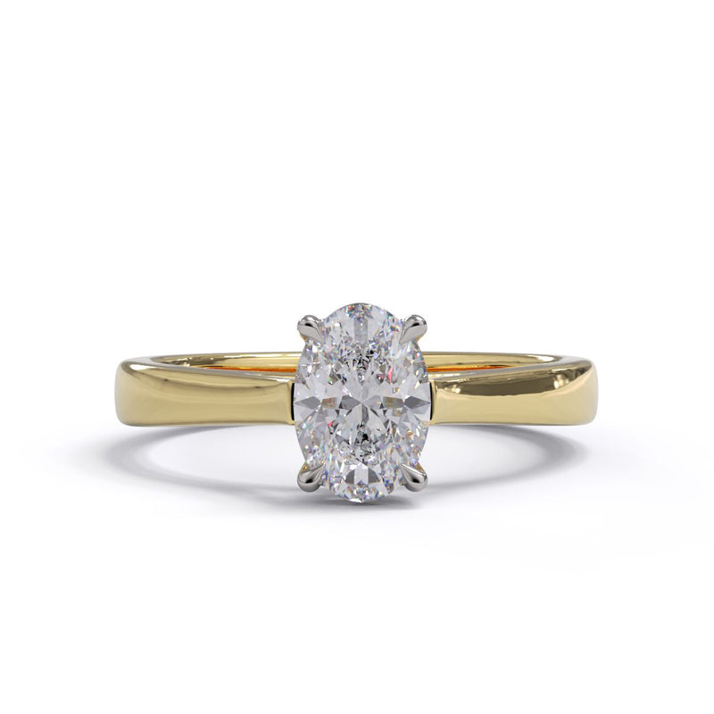 A yellow gold diamond engagement ring with a solitaire round diamond set on a platinum setting.