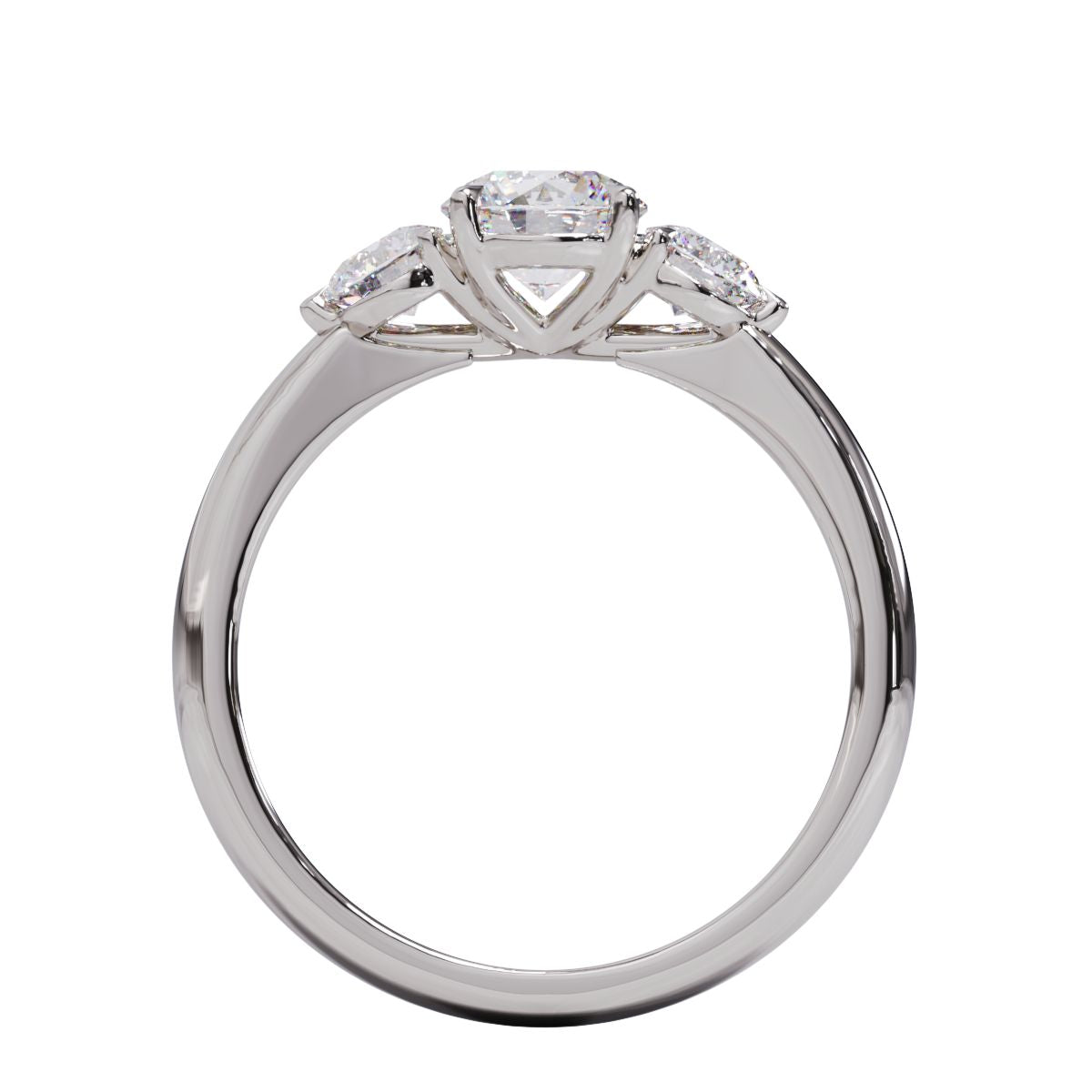 A three-stone diamond engagement ring with a platinum or white gold band and platinum setting.