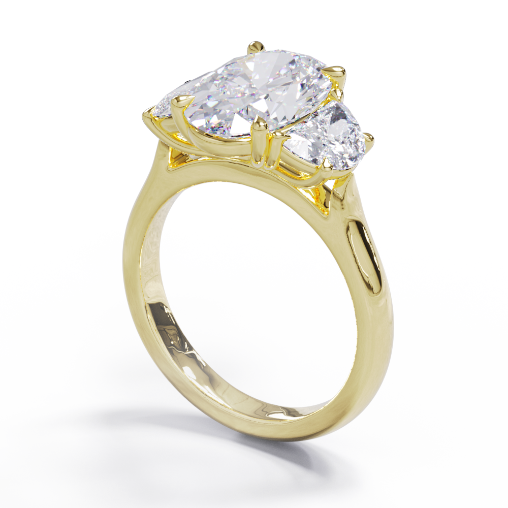 An exquisite white diamond engagement ring with an oval centerpiece flanked by two half moon diamonds, set in a gold band
