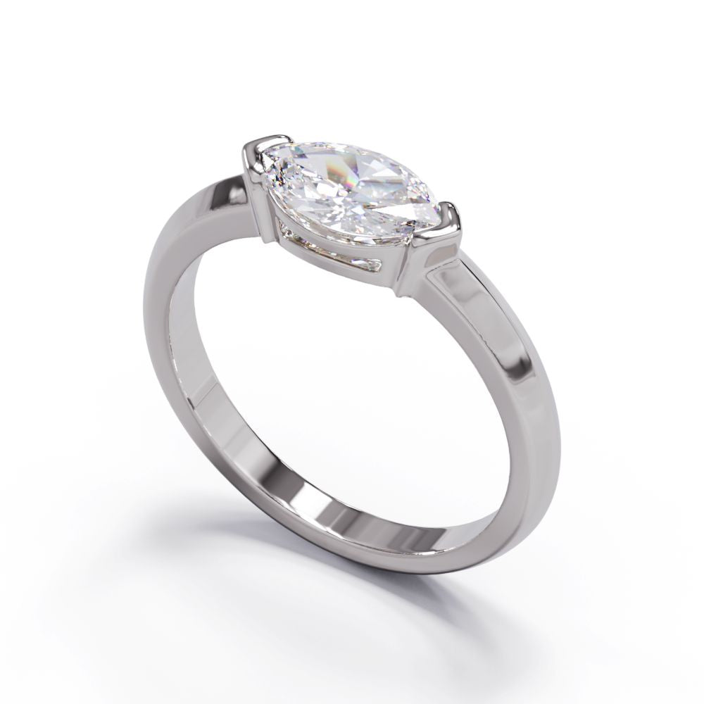 Diamond Bezel set ring in platinum or white gold. made to order and made in-house by our master jewellers and master diamond setter