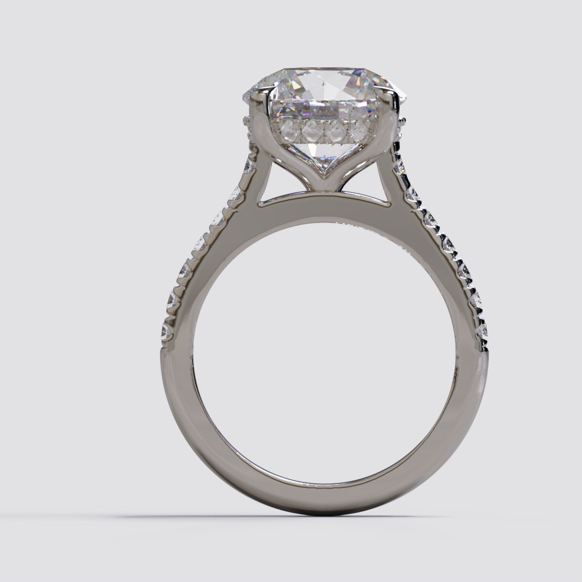 White Gold Ring. Round Brilliant Diamond Centre Stone with Hidden Halo and Pave diamonds on the band