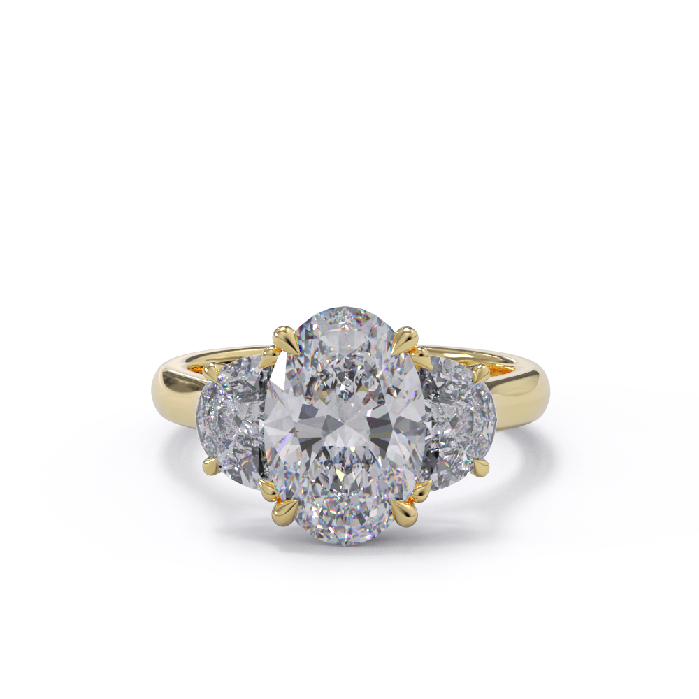 An exquisite yellow gold diamond engagement ring with an oval centerpiece flanked by two half moon diamonds, set in a gold band