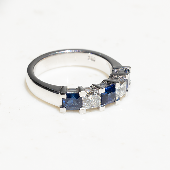 18k white gold ring with two diamonds and three sapphires