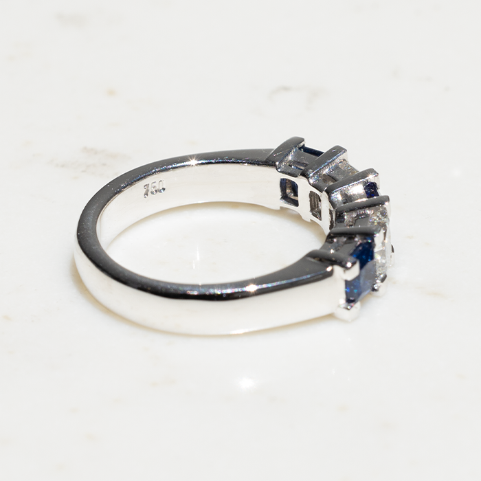 18k white gold ring with two diamonds and three sapphires
