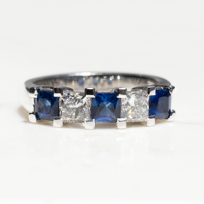 18k white gold ring with two diamonds and three sapphires