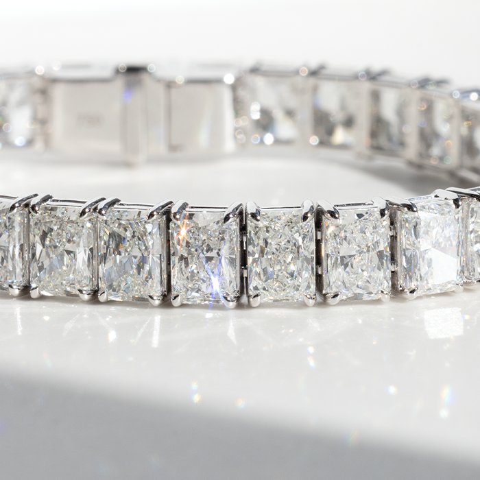 close up of tennis bracelet with large diamonds