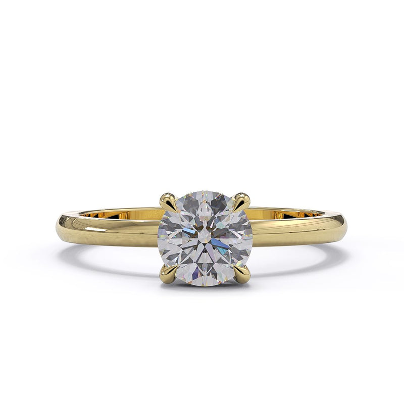 A single round diamond ring with a gold band.