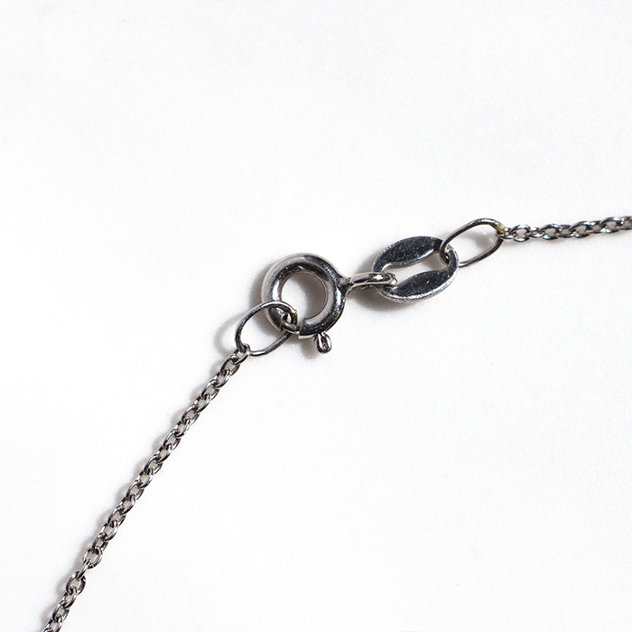 close up of necklace chain clasp
