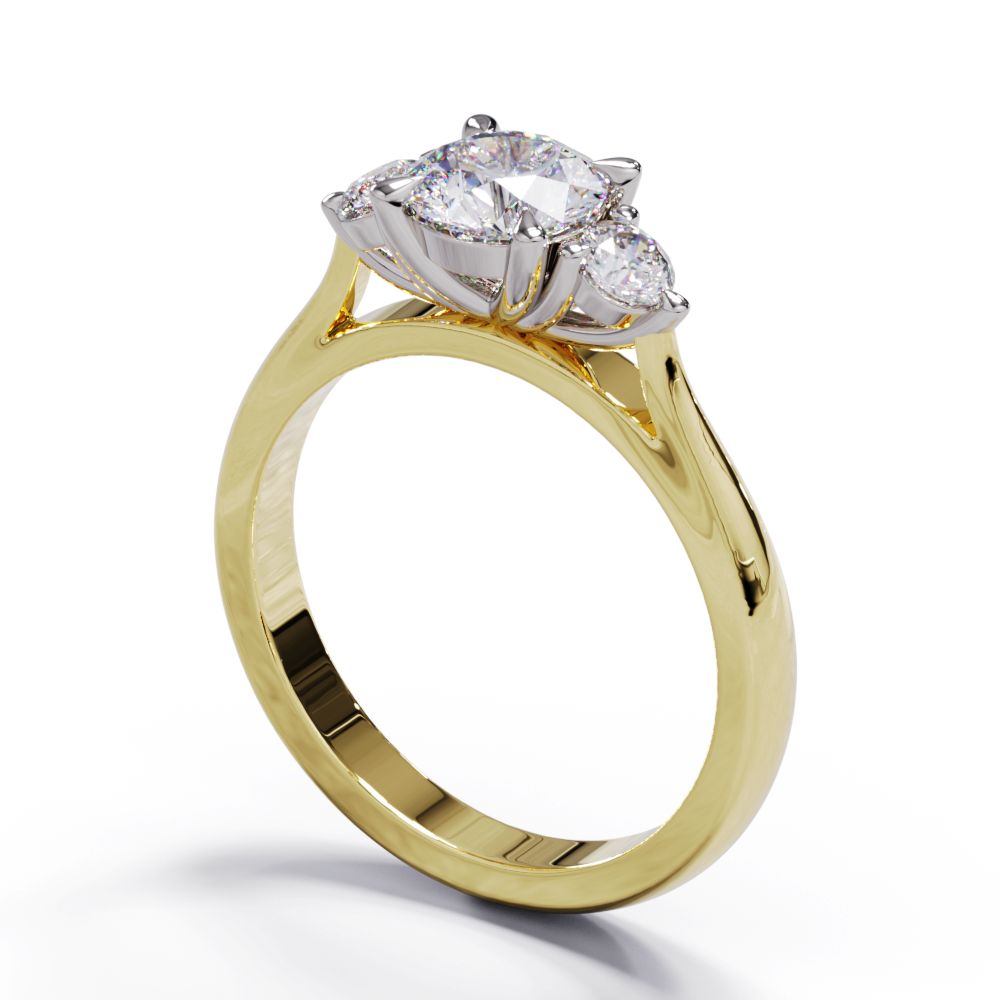 A three-stone diamond engagement ring with a central larger diamond flanked by two smaller diamonds, set in a yellow gold band.