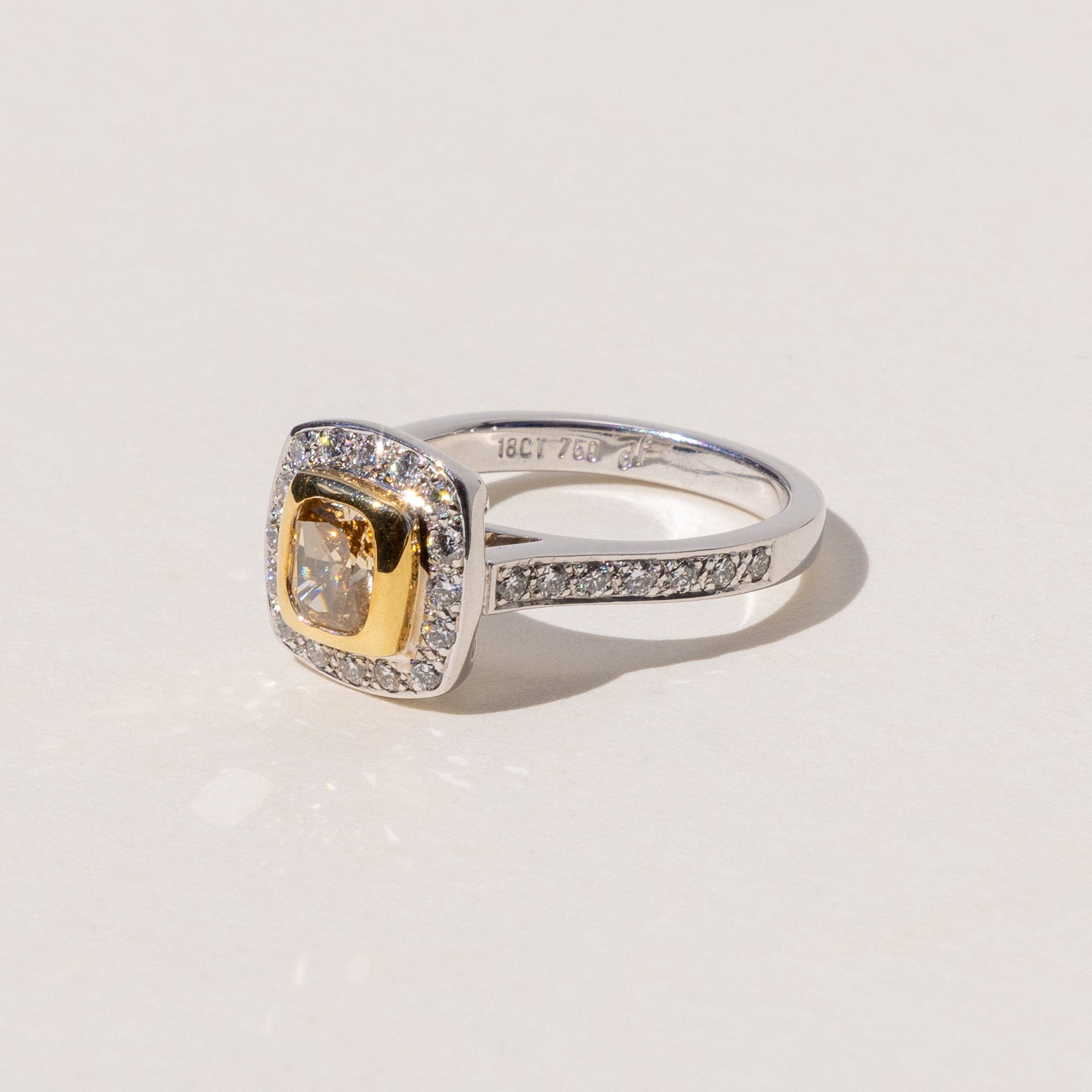 white and yellow gold square engagement ring