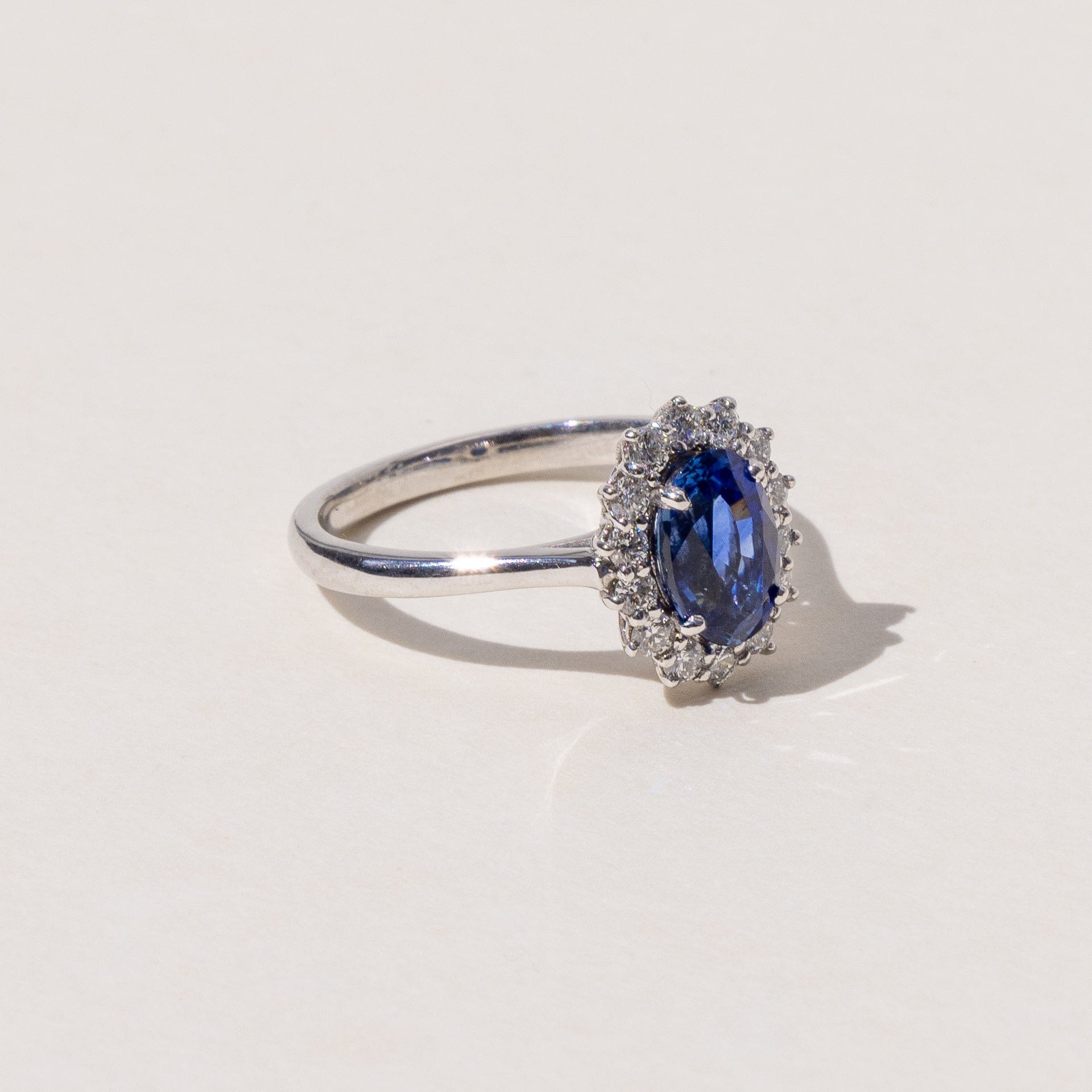 Olivia Oval Blue Sapphire Halo Ring Meaden Master Jewellers