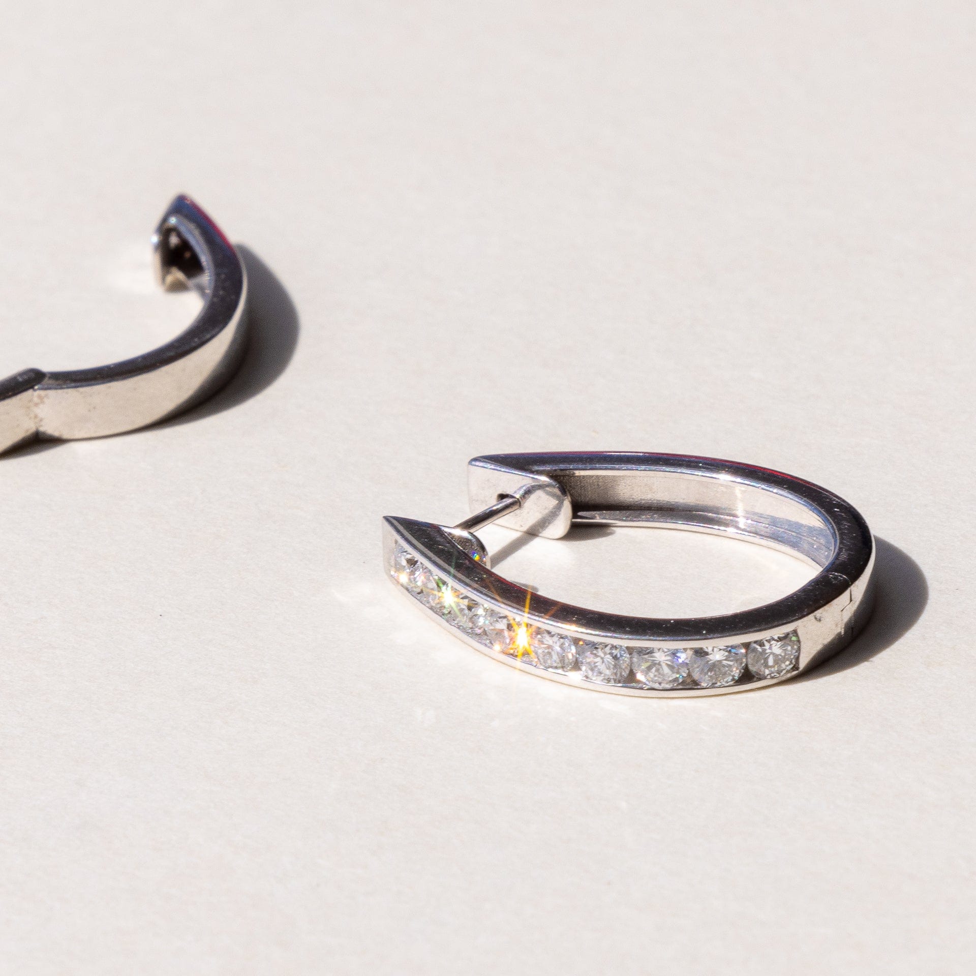 earrings with pave diamond round brilliant