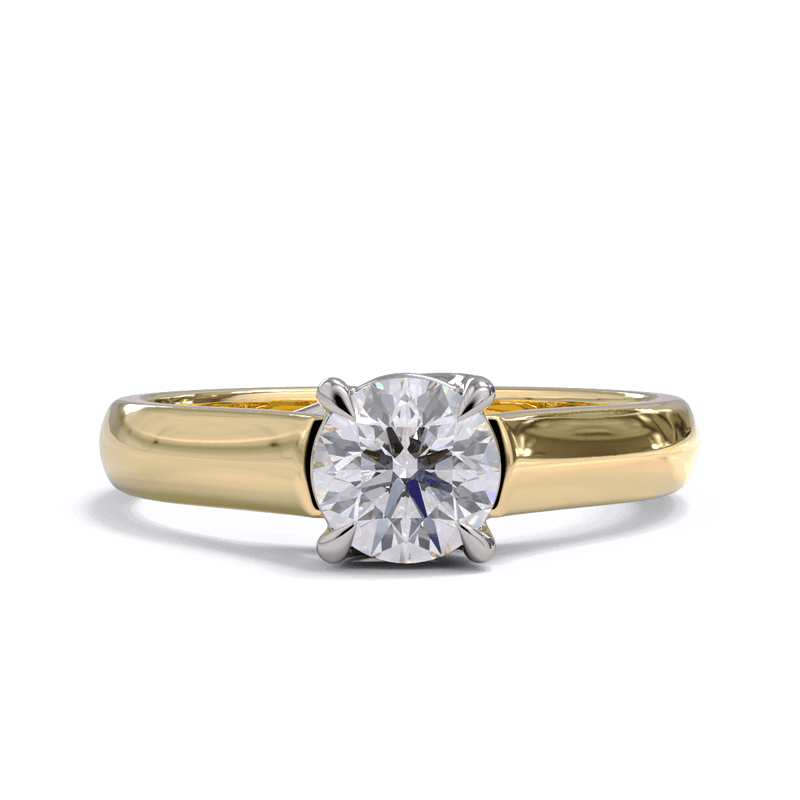 A round diamond solitaire engagement ring with a gold band.