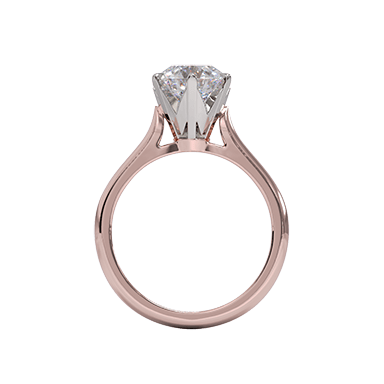 A rose gold-banded, round-cut diamond solitaire engagement ring.