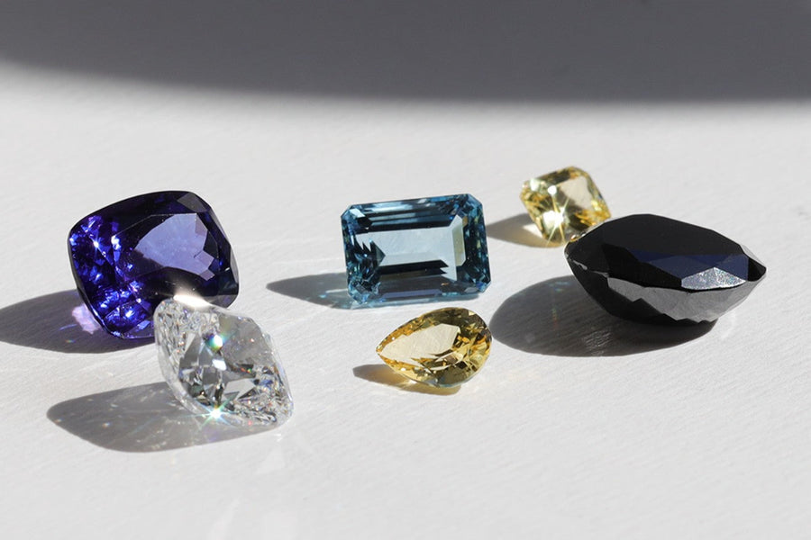 diamonds and gemstones in a cluster on a white background. Auckland, New Zealand