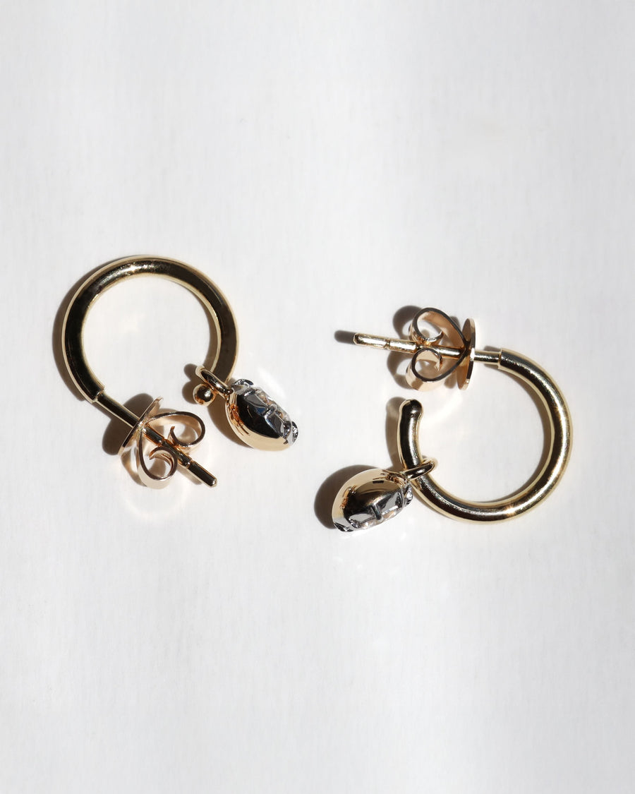 The best gold diamond huggie earrings, handmade in Auckand New Zealand by award winning jewellers. 