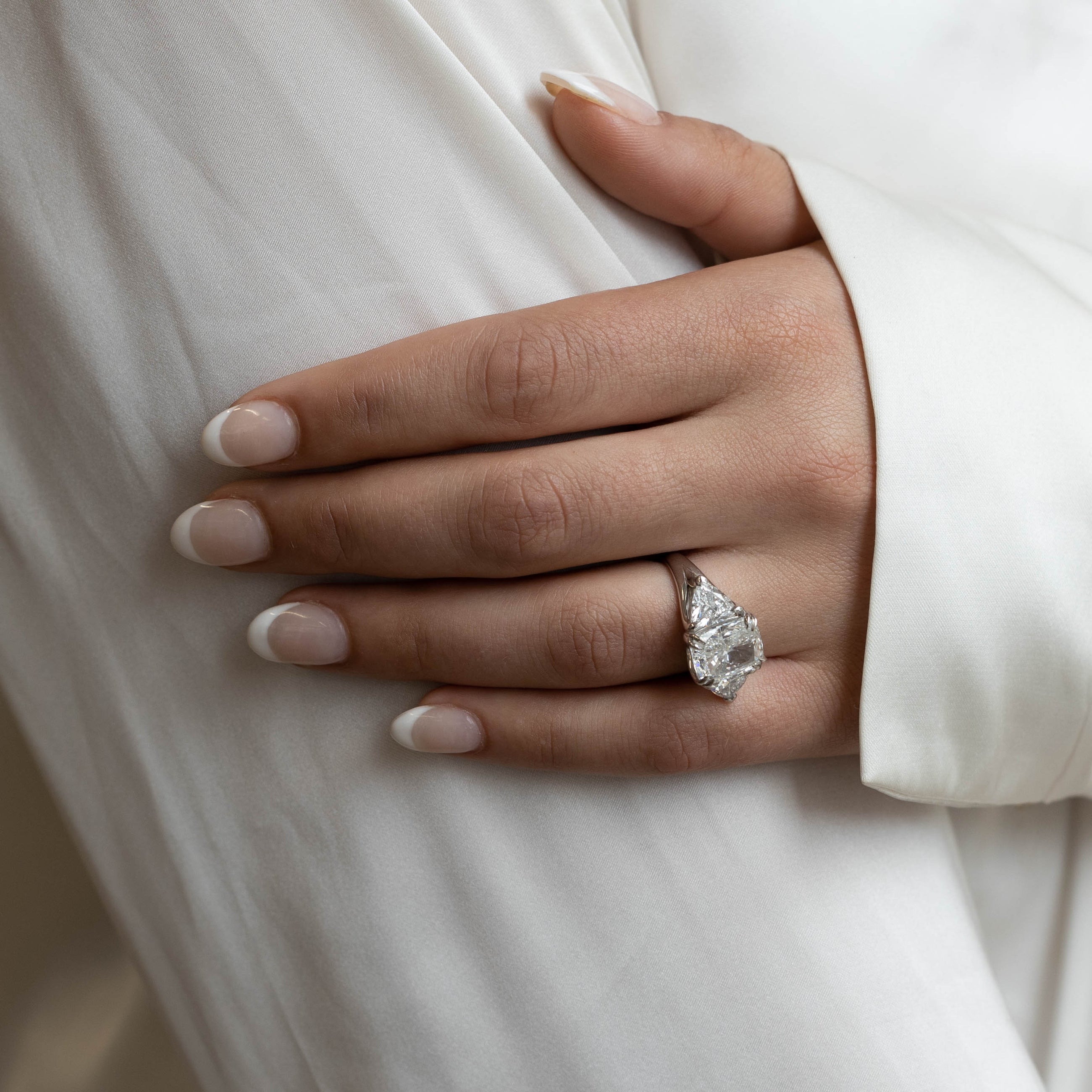 engagement ring, 3 stone diamonds, princess cut.