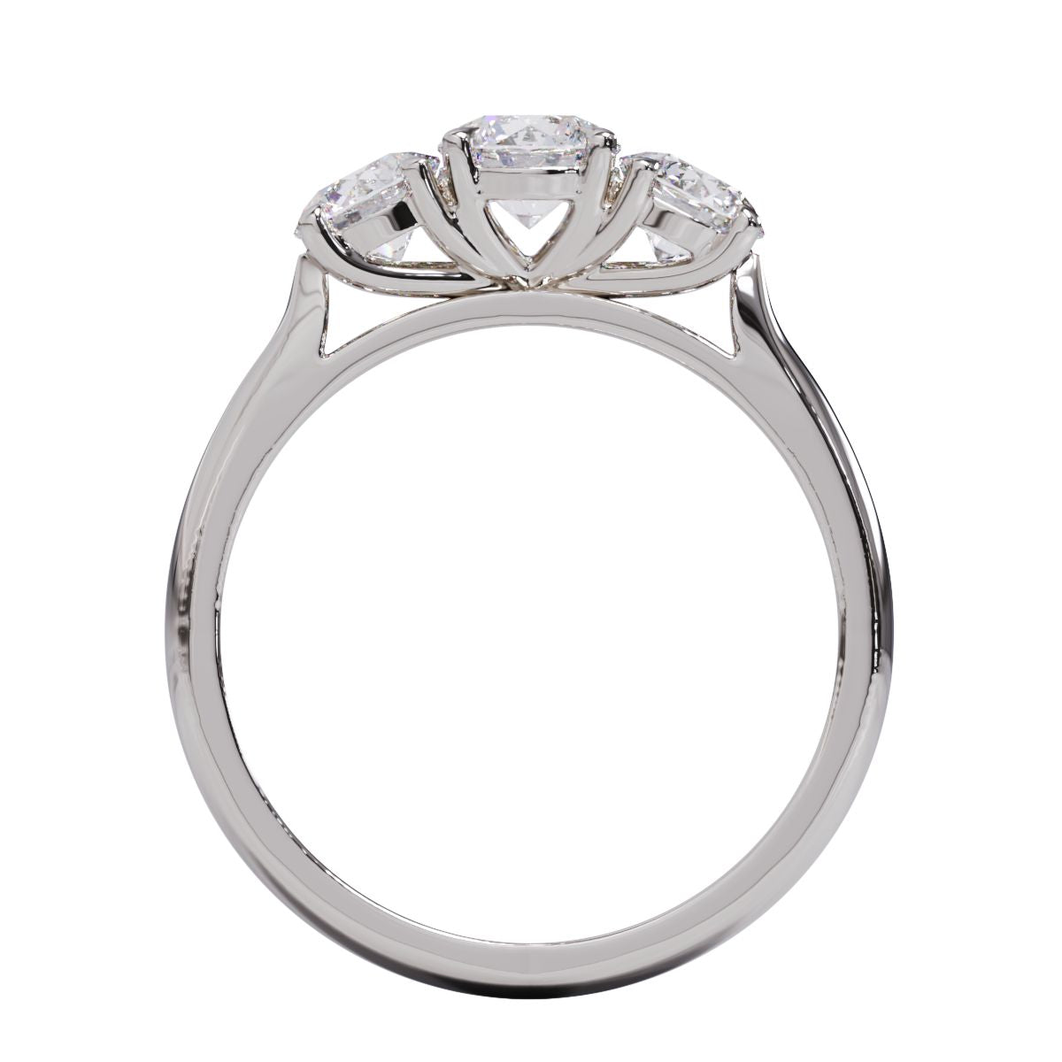A three-stone diamond ring with a white gold or platinum band and platinum setting for the diamonds.