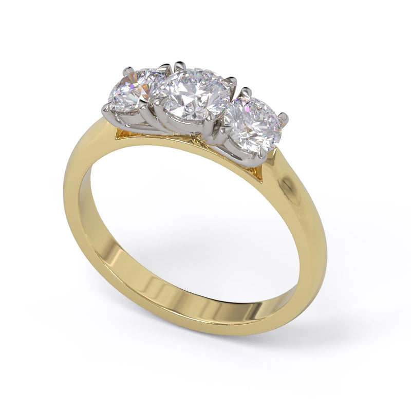 A three-stone diamond ring with a yellow gold band and platinum setting for the diamonds.