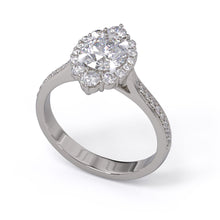 A gold diamond ring with a large round central diamond surrounded by a halo of smaller round diamonds. Set in platinum on a platinum or white gold band with pave down on the band, displayed against a white background.