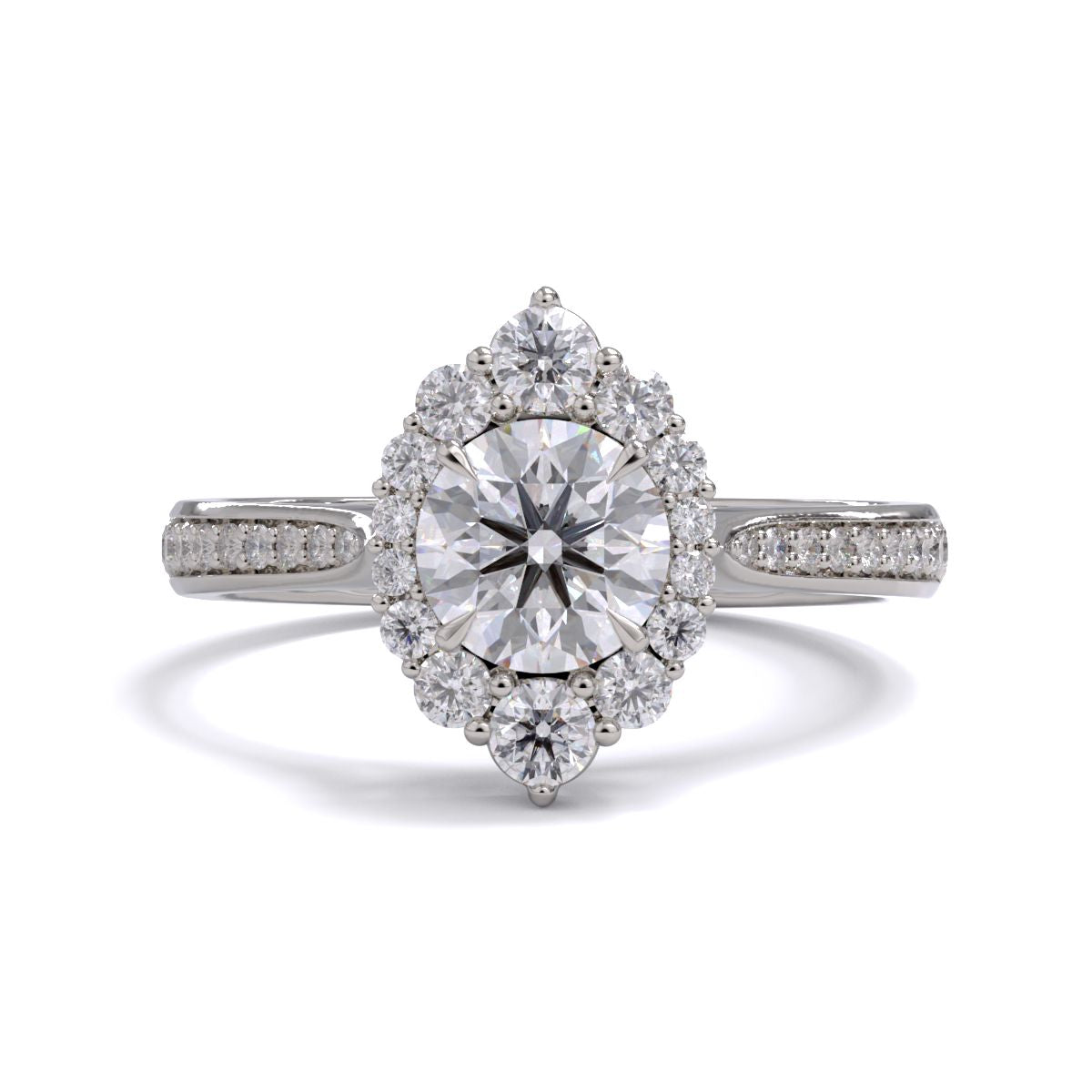 A gold diamond ring with a large round central diamond surrounded by a halo of smaller round diamonds. Set in platinum on a platinum or white gold band with pave down on the band, displayed against a white background.