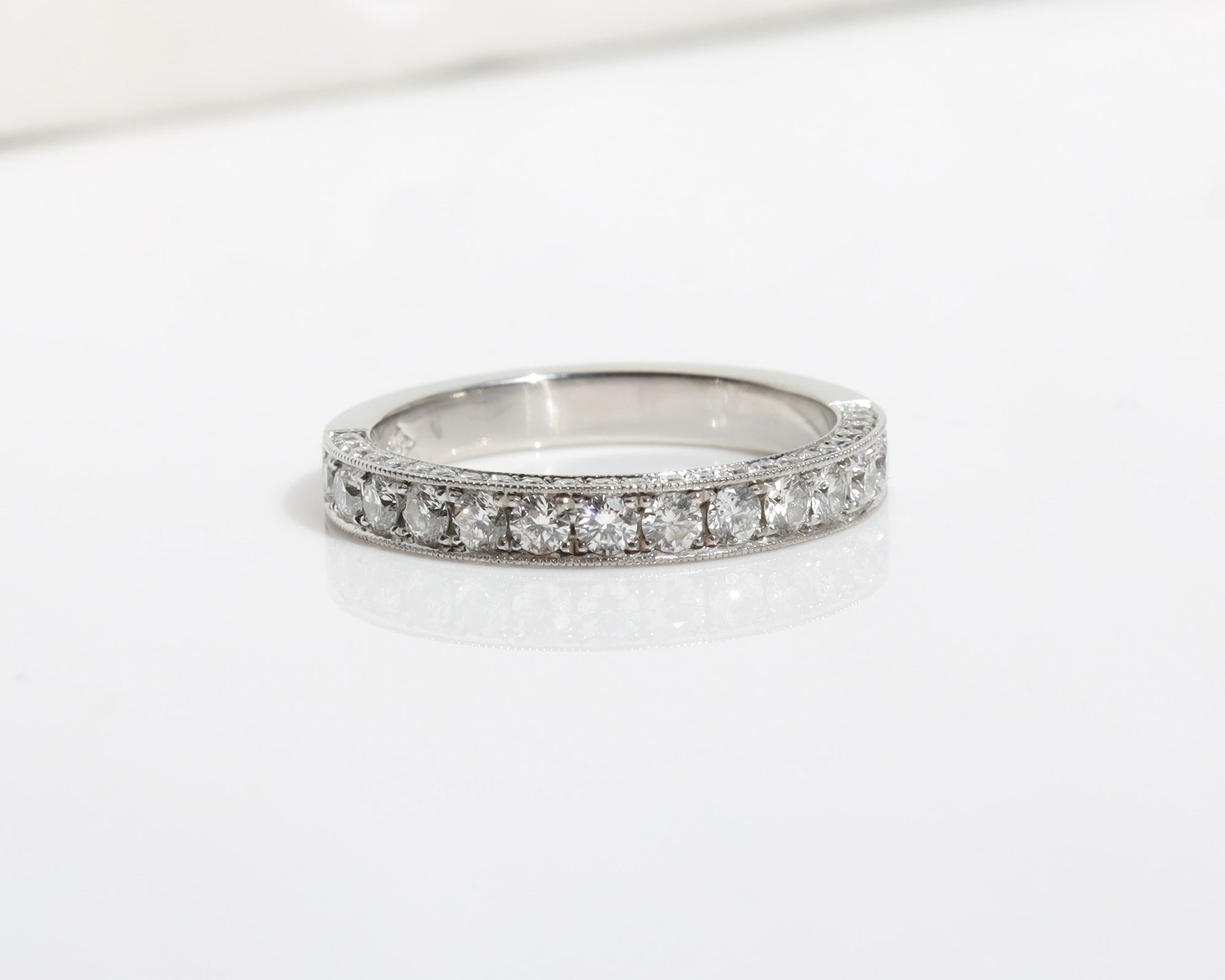 Platinum wedding band with 3 rows of pavé diamonds 