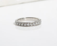 Platinum wedding band with 3 rows of pavé diamonds 