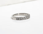 Platinum wedding band with 3 rows of pavé diamonds 