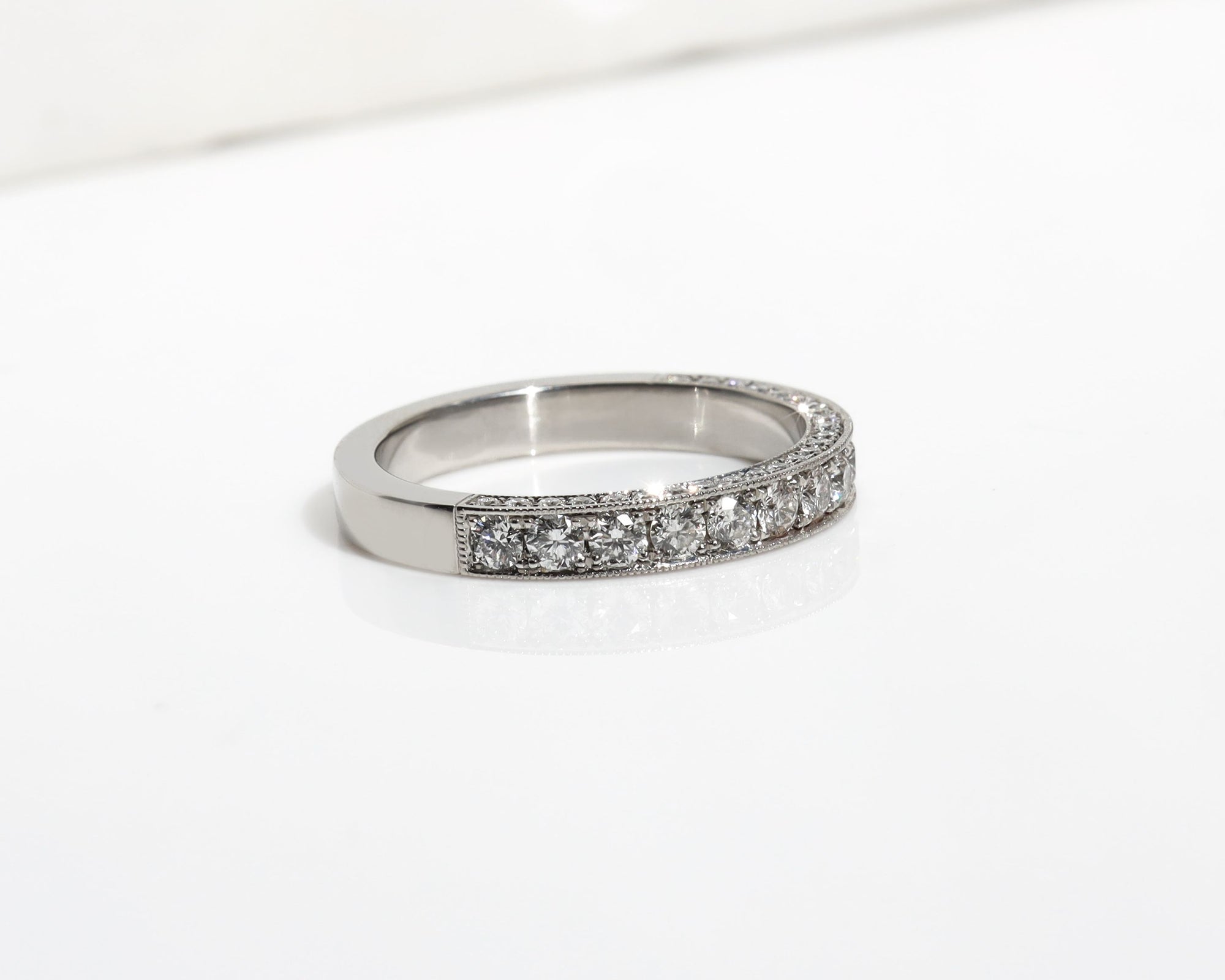 Platinum wedding band with 3 rows of pavé diamonds 
