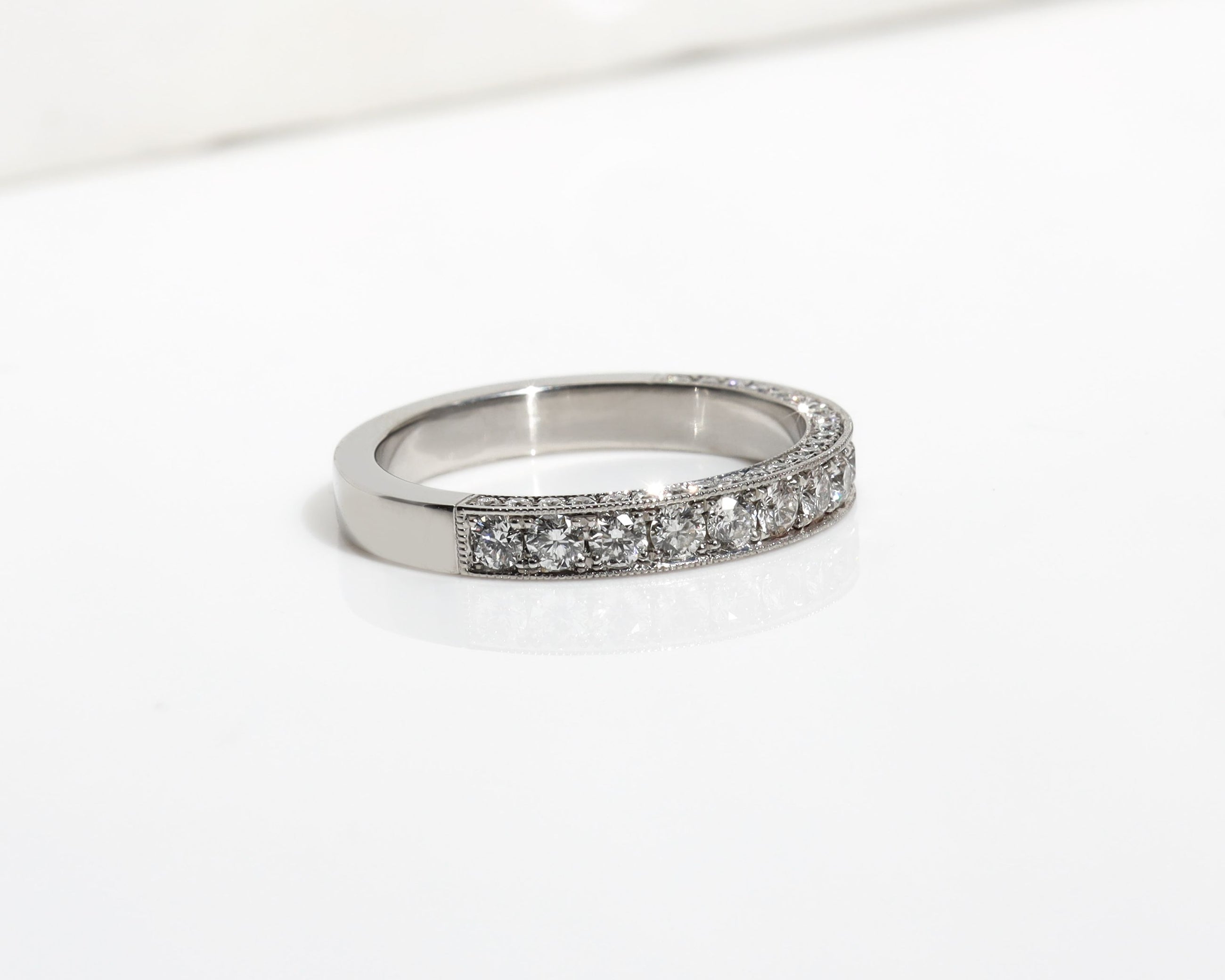 Platinum wedding band with 3 rows of pavé diamonds 