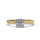 Yellow gold round diamond engagment ring set in platinum. tappered yellow gold wedding band 