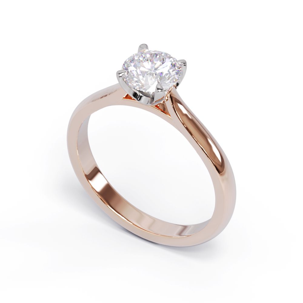 Rose gold ring with a diamond on a white background