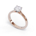 Rose gold ring with a diamond on a white background