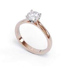 Rose gold ring with a diamond on a white background