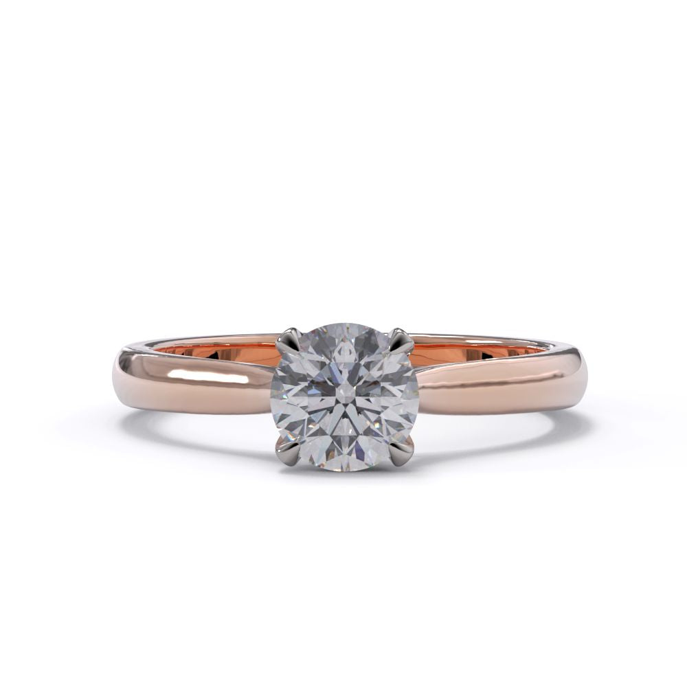 Rose gold ring with a diamond on a white background