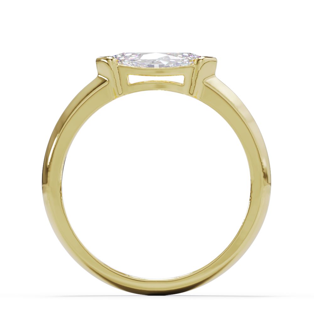 standing solid gold ring with a modern bezel set settiing