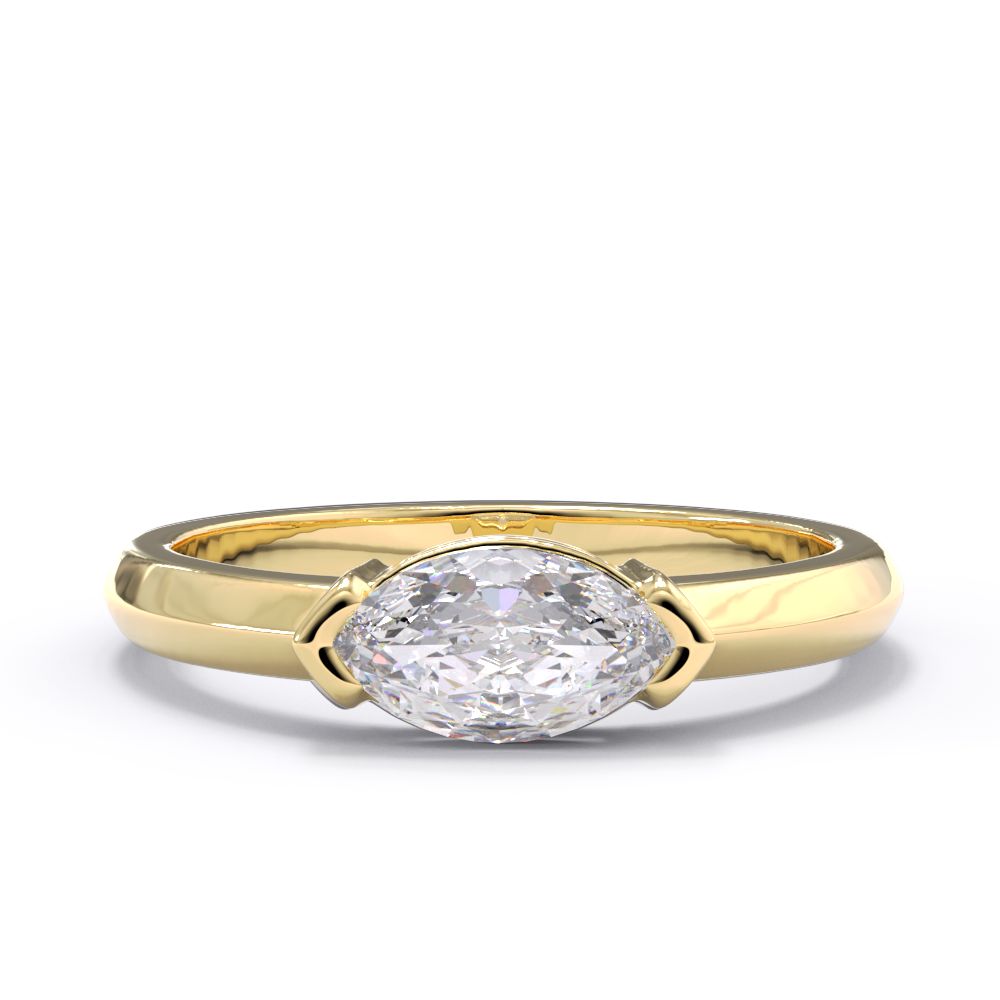 Gold ring with a large diamond on a white background