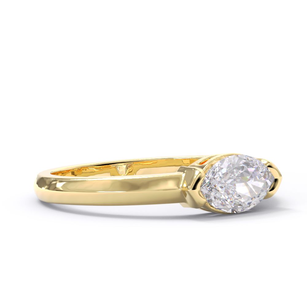 Gold ring with a diamond on a white background