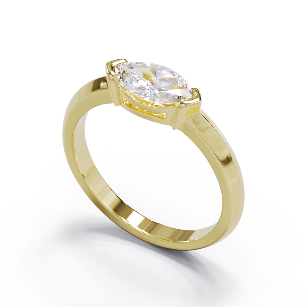 yellow solid gold ring with marquise diamond in a modern bezel set setting 