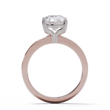 Rose gold ring with a diamond on a white background