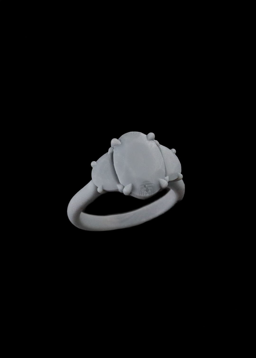 Resin model, 3D printed engagement ring on a black background. Made in New Zealand.