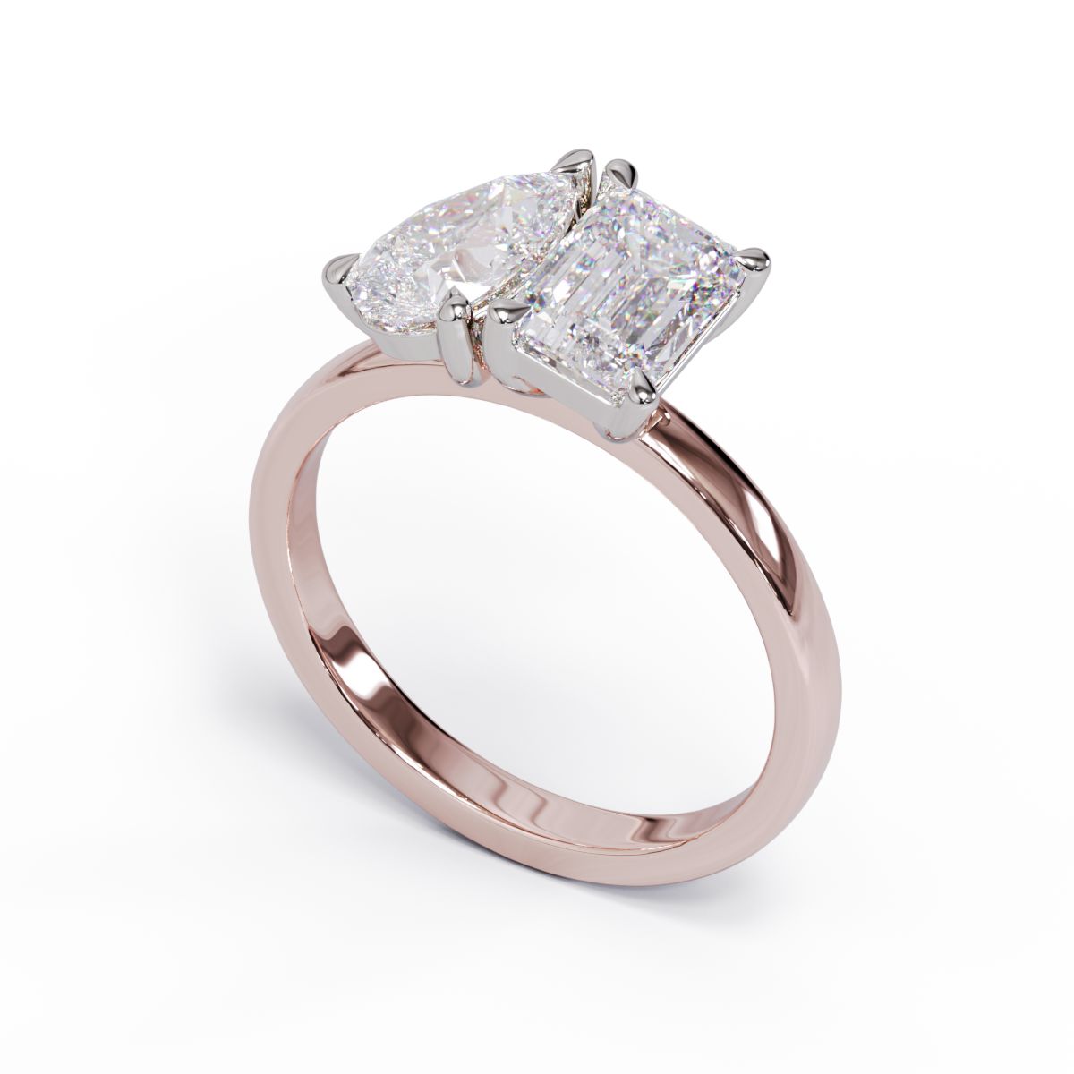 A solitaire diamond Toi et Moi style ring with a rose gold band set in a platinum setting.