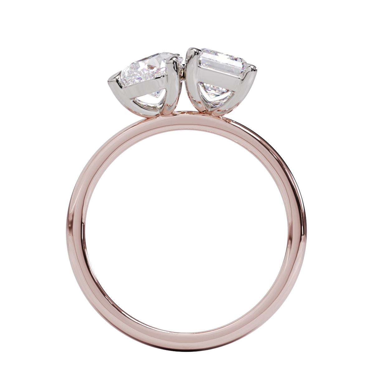 A solitaire diamond Toi et Moi style ring with a rose gold band set in a platinum setting.