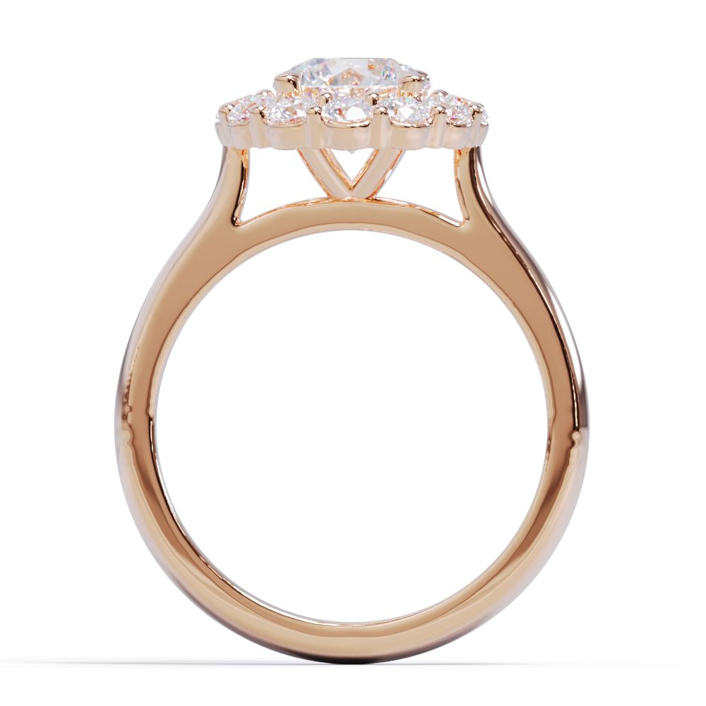 Rose gold ring with a diamond cluster on a white background