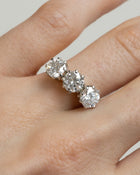 3 Diamond engagement ring worn on finger