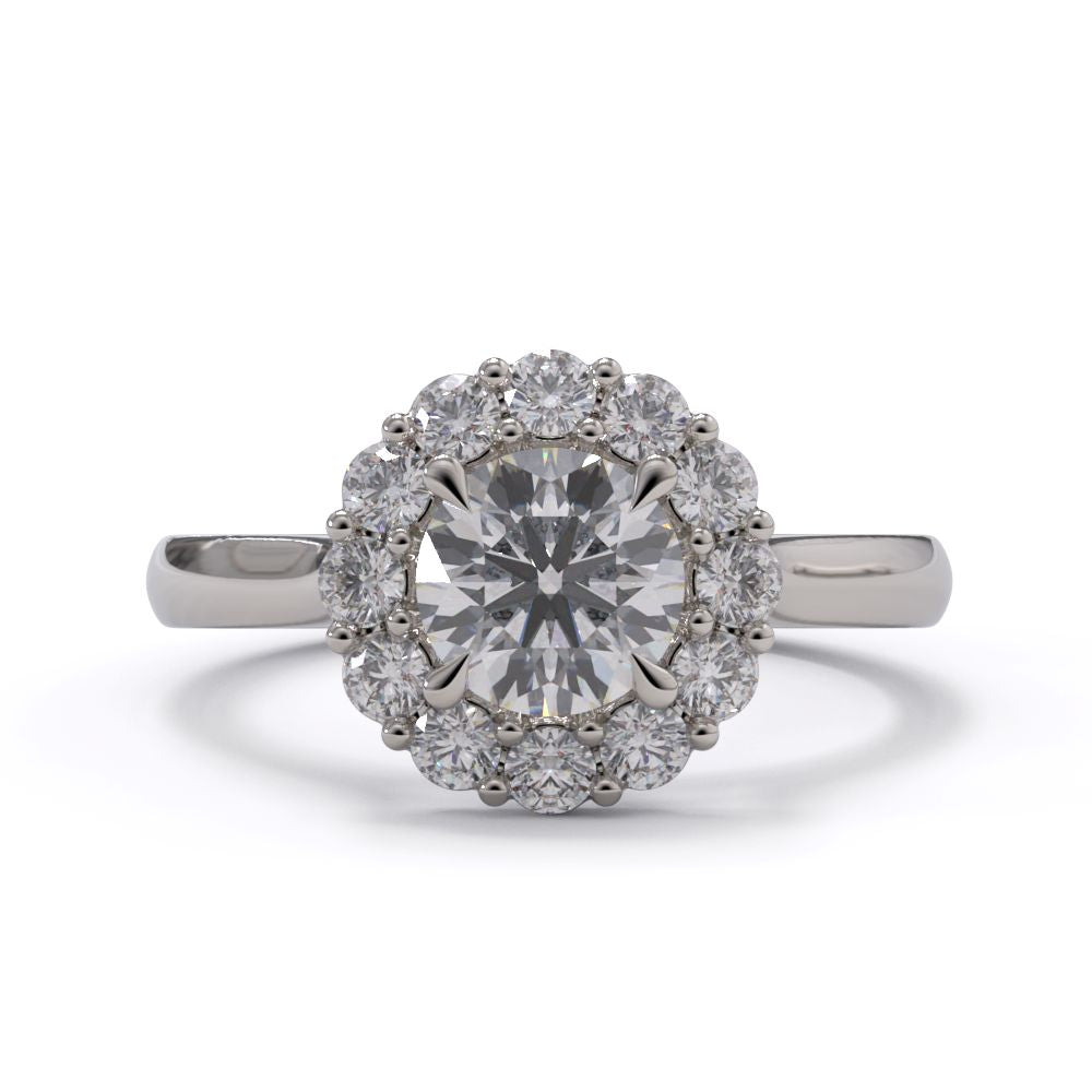 Diamond ring with a halo on a white background