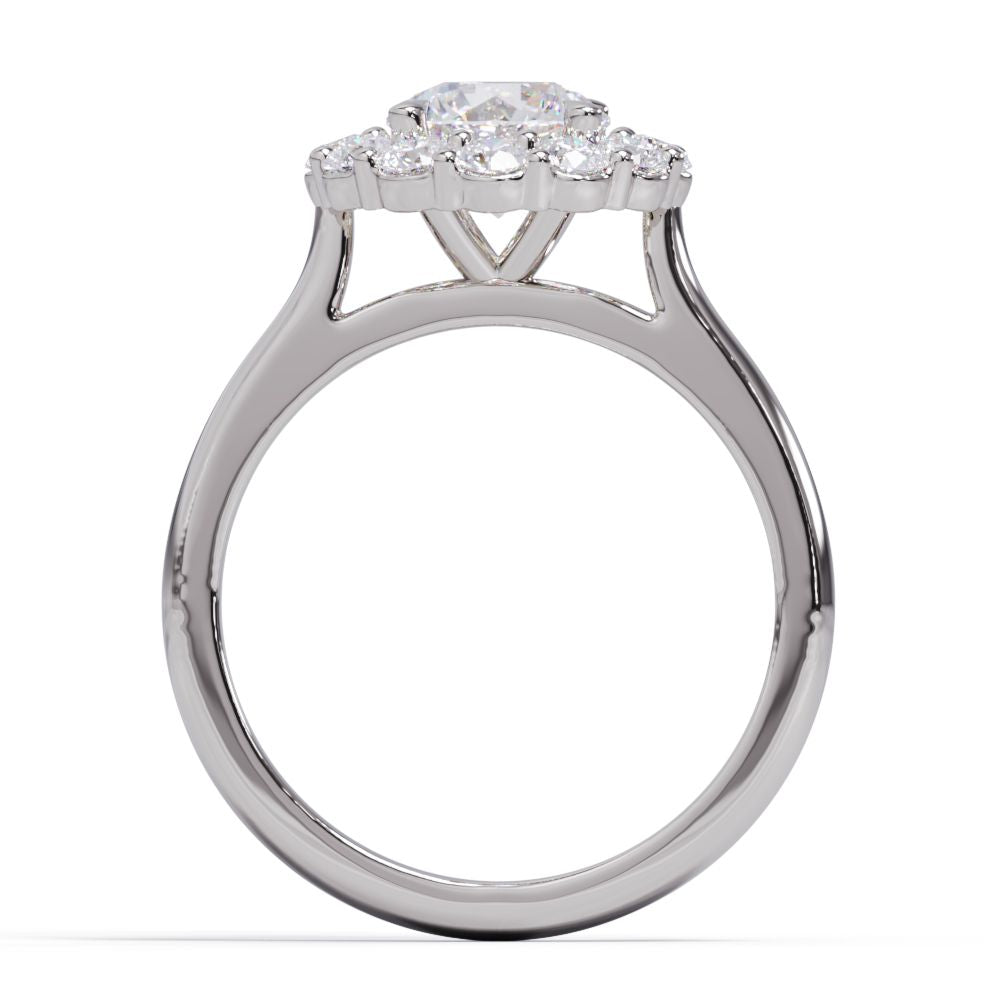 Diamond ring with a central gemstone and smaller stones on a white background