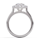 Diamond ring with a central gemstone and smaller stones on a white background