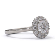 white gold or platinum round diamond ring 